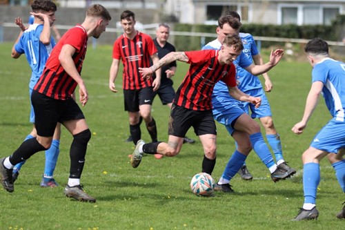 Goodwick's Will Haworth dribbling through Monkton's defence