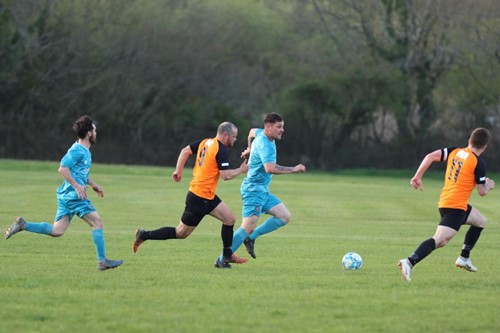 Johnston's Kieran Walker chases down a Tenby runner