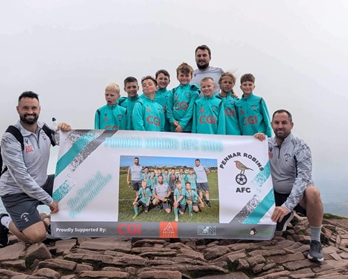 Pennar Robins U10s Scale Pen-y-Fan for Football Fundraiser